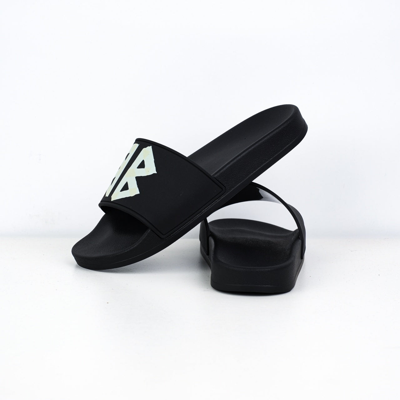 Balenciaga
Tape-logo slides
