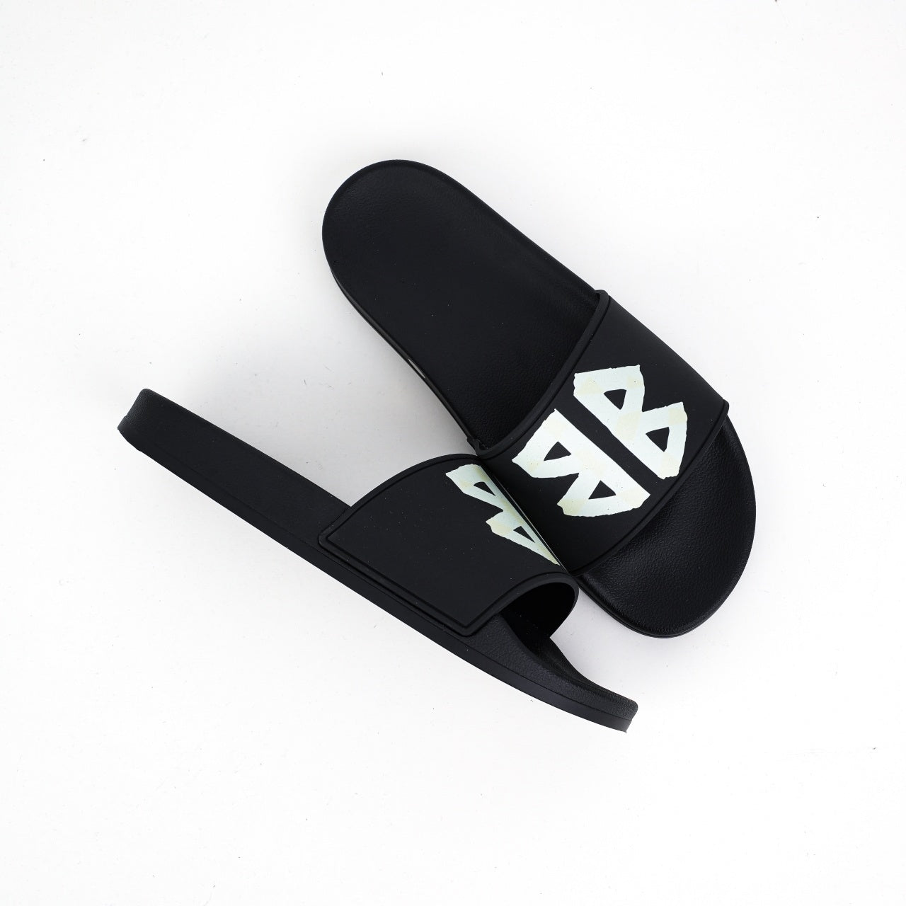 Balenciaga
Tape-logo slides